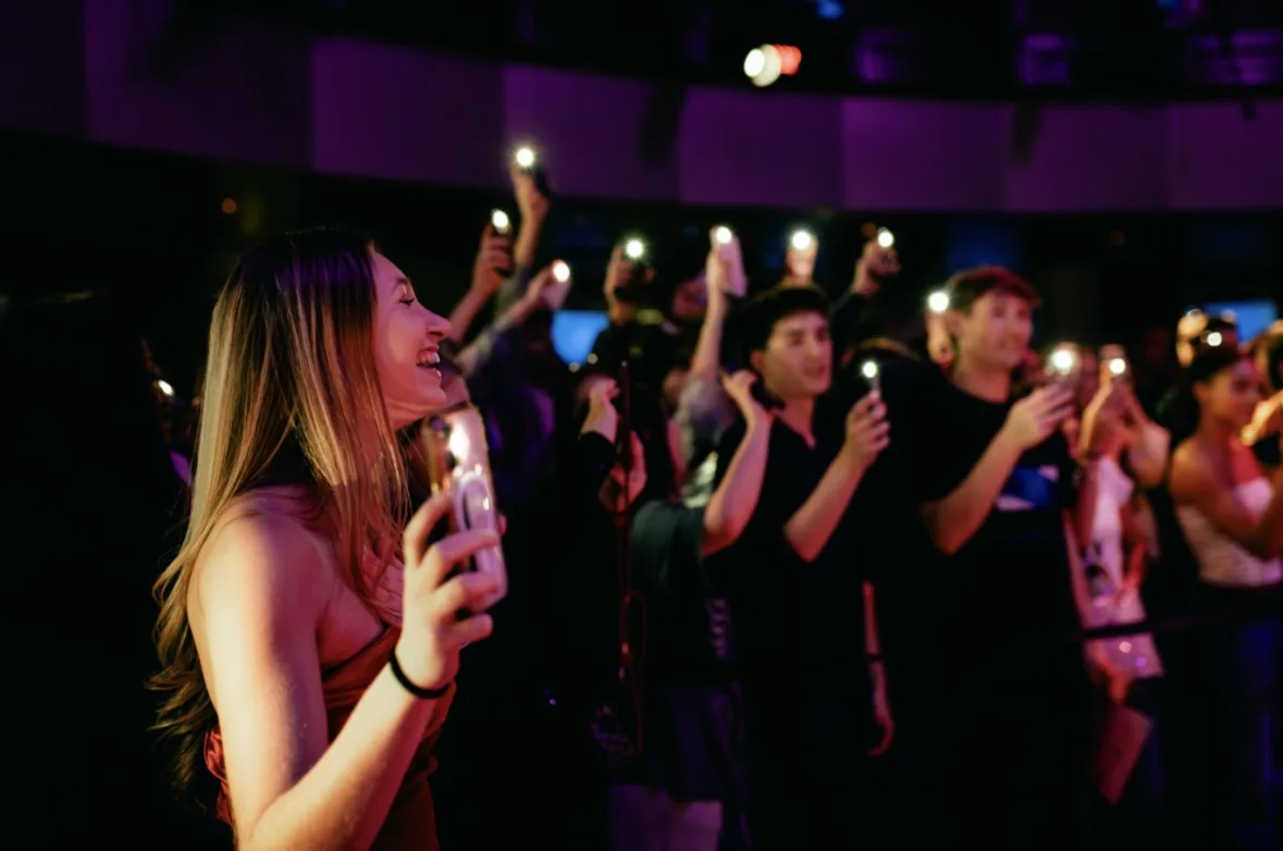 Phones in the air during the performance