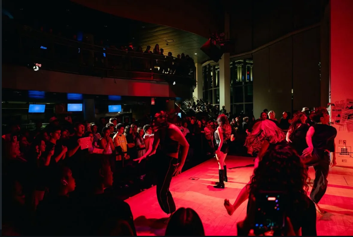 The audience filling the venue floor