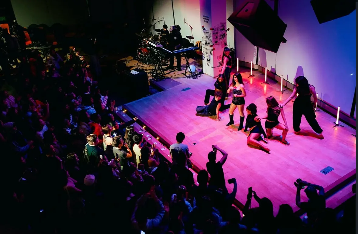 Wide shot of the stage and crowd during the show